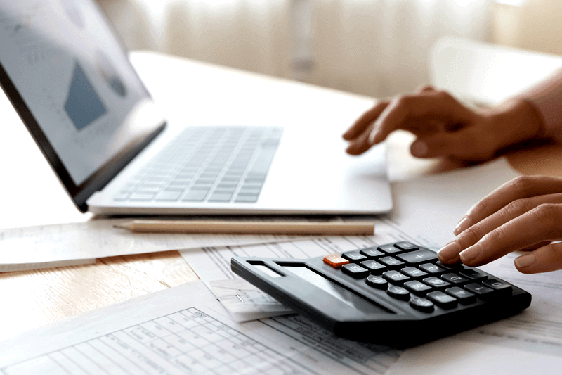 A person calculates potential invesment returns