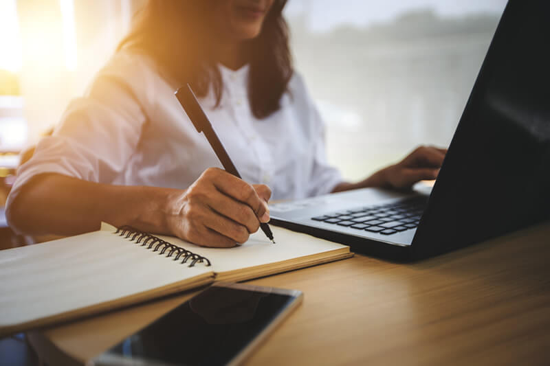 A person calculating a repayment plan