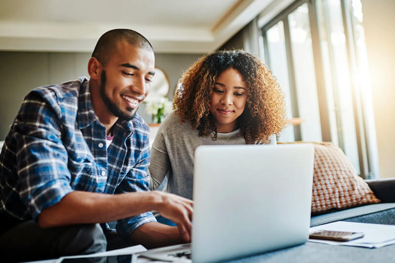 A couple explores home refinancing